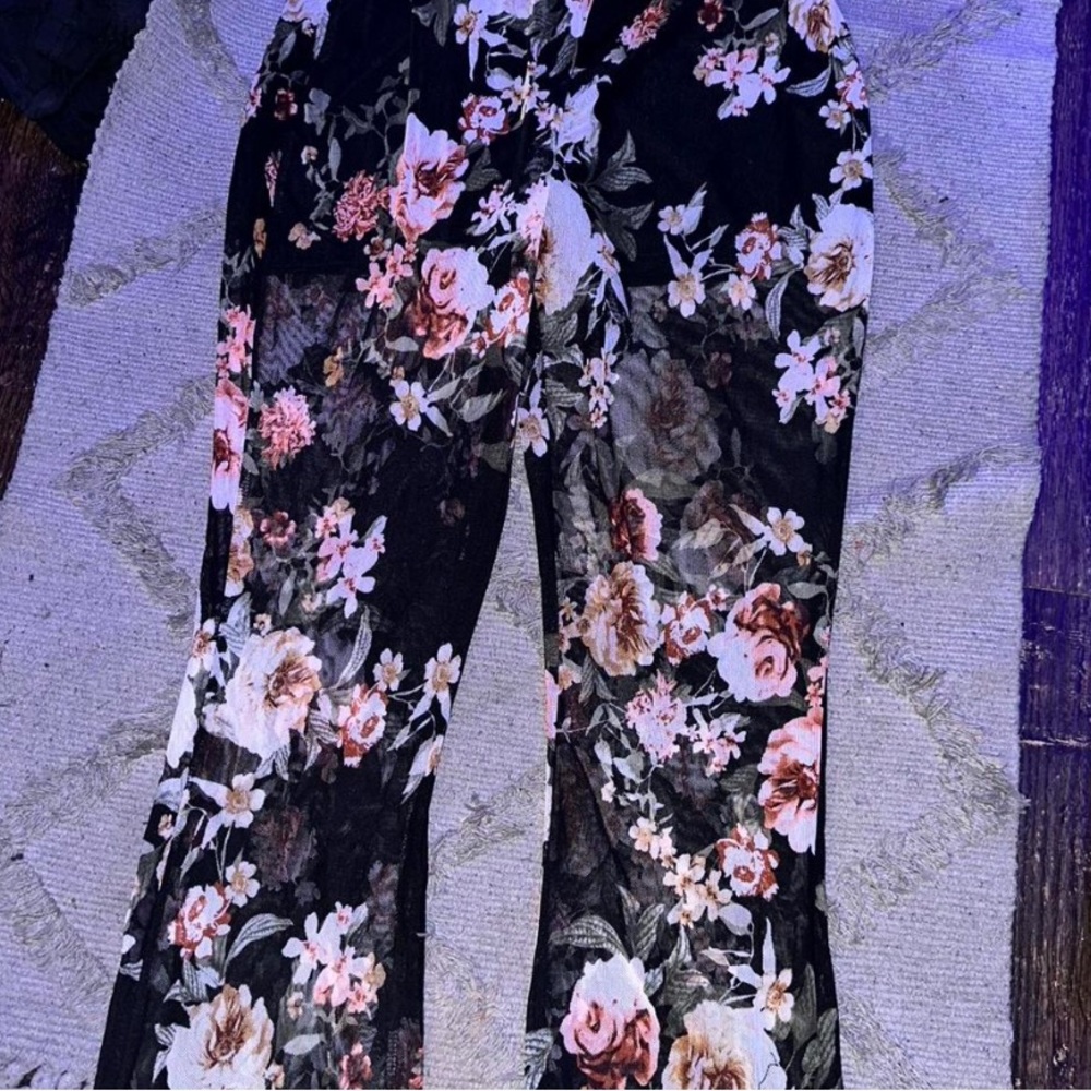Floral dress pants that stretch, and fit very nice to the body.